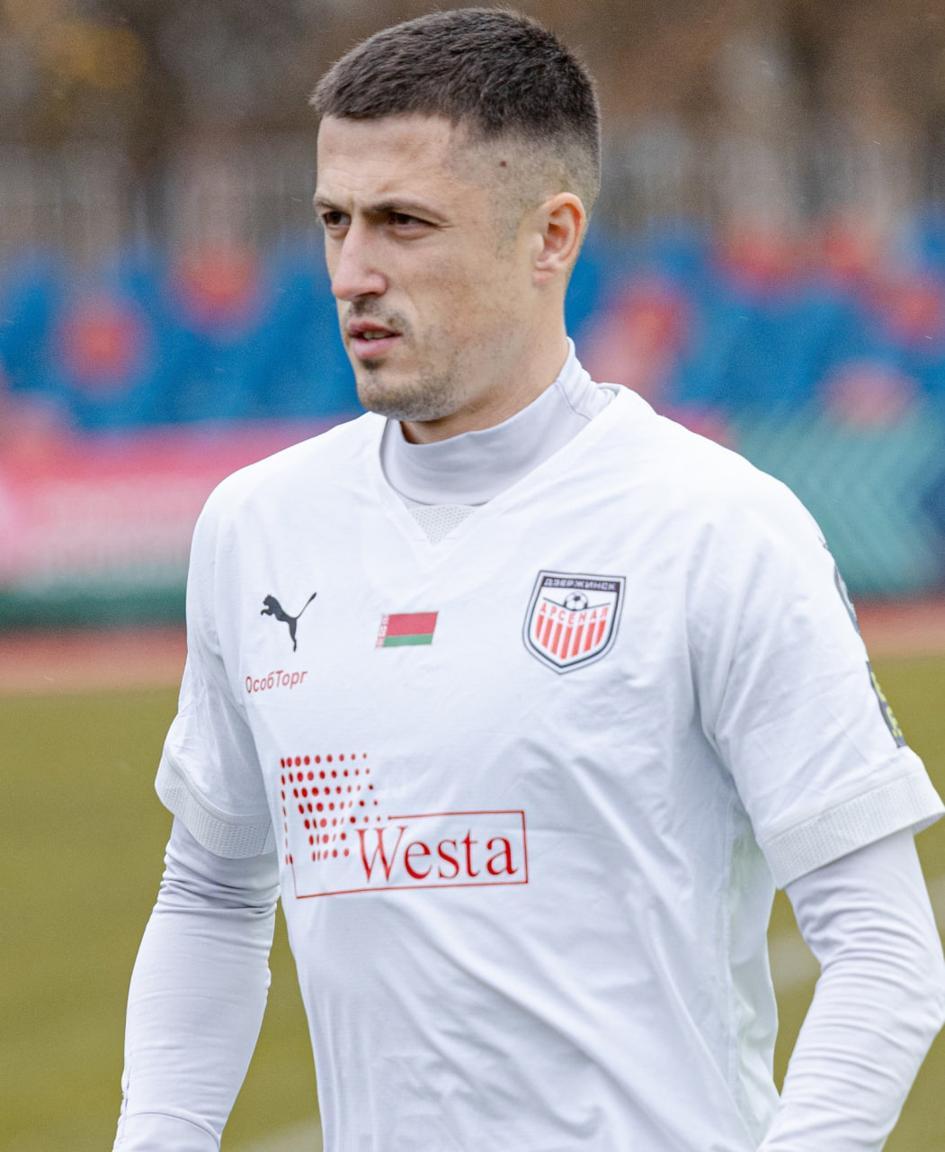 Александр Позняк